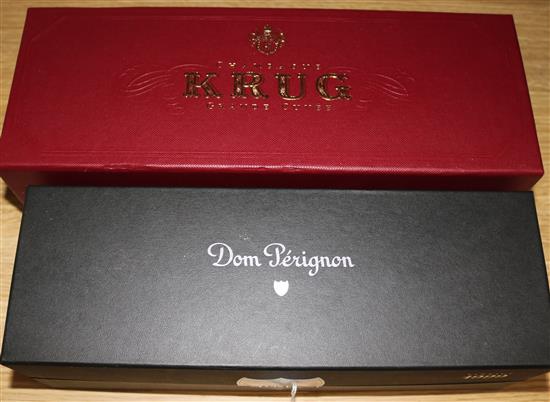 One bottle of Dom Perignon Vintage Champagne 1999 and one bottle of Krug Grand Cuvee Champagne,